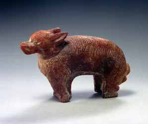 Figura de um cachorro (âmbar)